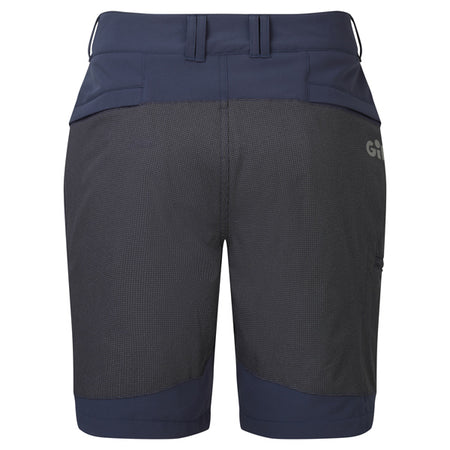Gill UV024 UV Pro shorts i navy, set bagfra med fokus på det strækbare materiale
